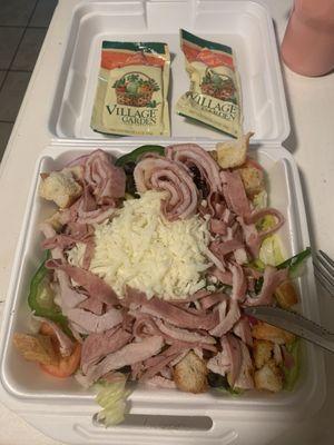 A Delicious Chefs Salad! Cheese, 3 different kinds of meat, tomatoes, onion, green peppers, croutons lettuce  Oh So Delicious