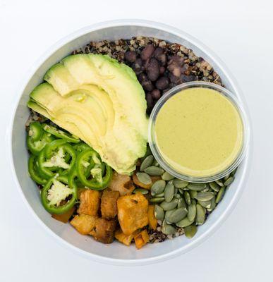 Nourish Bowlwarm quinoa*, roasted sweet potato*, warm black beans*, avocado*, jalapenos*, pumpkin seeds*, green tahini dressing