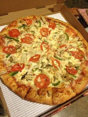 Garden pizza with added peppers and chicken