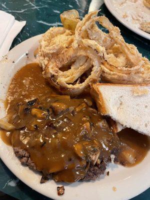 Chopped steak with onions, mushrooms, and gravy.