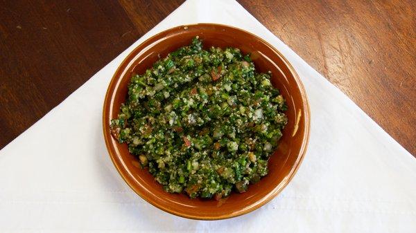 Tabouleh made of parcley cracked wheat tomatos cucumber onions mixed with fresh lemo juice and olive oil