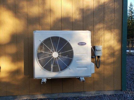 Mini split ductless outdoor condenser installation.