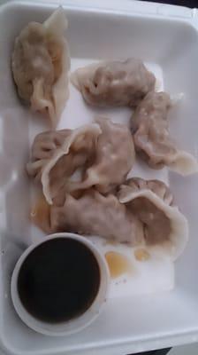 Steamed pork dumplings. Has some sort of salty juice (not the dipping sauce) inside of it.