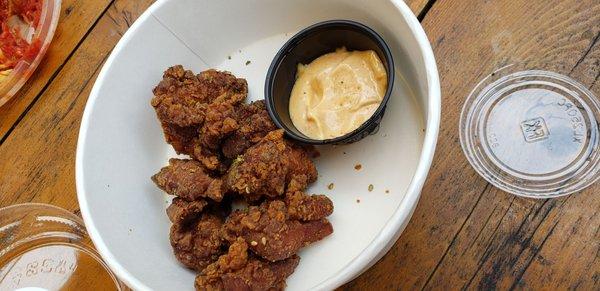 The salty 7 small pieces of karaage. Note how much space is left in the container even considering the mayo sauce.