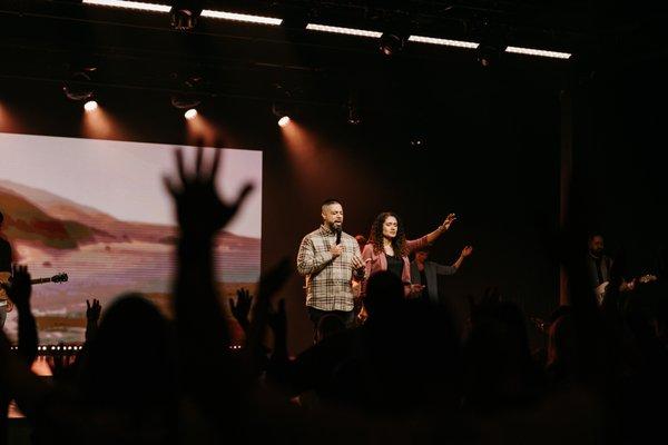 Campus Pastors Oscar & Dalia sharing a message at Christ Fellowship Church in Royal Pam Beach, FL