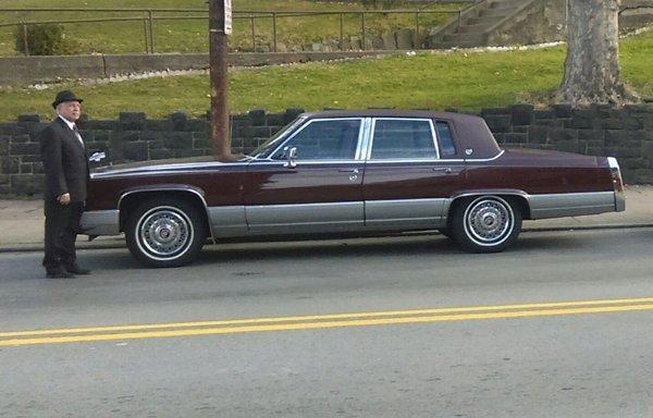 Classic Cadillac autos, color matched to funeral home corporate colors