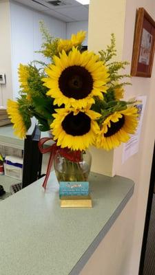 Beautiful flowers in the waiting room. The office feels really warm and inviting.