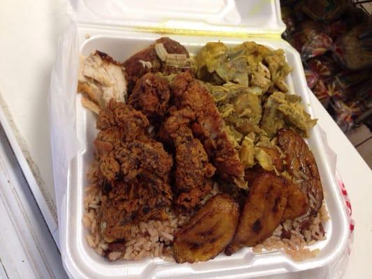 Curry chicken w/ fried chicken rice and beans and plantains.