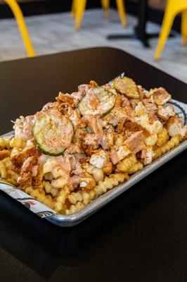 Nash + Tender Fries - Loaded Fries Served w/ Mac N' Cheese, Coleslaw, Pickles, and Special Sauce.