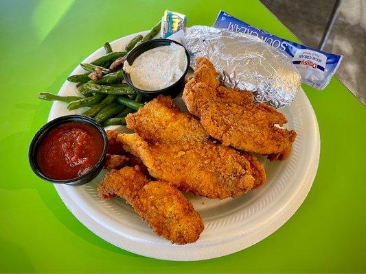 Small order of catfish (which isn't very small) with green beans, baked potato, and homemade cocktail and tartar sauces