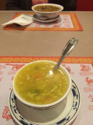 The closer soup is in cup while the further away soup is in bowl size.