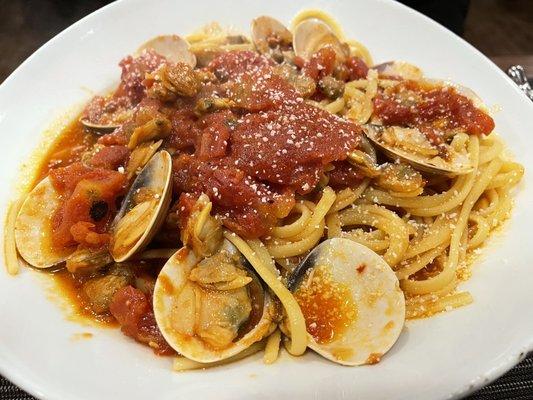 Clams over angel hair in red sauce