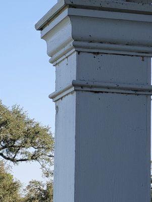 Hole where cannon ball was once lodged in the column to the left of the picture