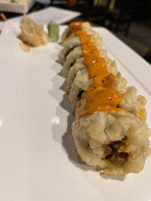 Vegetable Roll w jalapeños instead of cucumbers, tempura and sriracha chili oil added