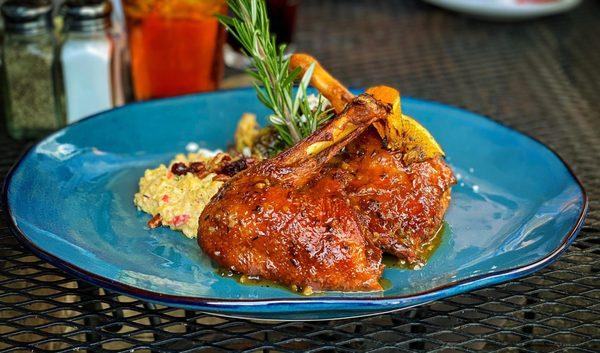 Crispy Roasted Duck à l'orange (Grand Marnier Orange Glaze, Lemon-Bacon-Goat Cheese Brussel Sprouts, Pecan-Dried Cranberry Grits)