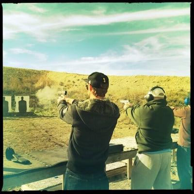 The students are demonstrating their proficiency with a pistol in the CHL.