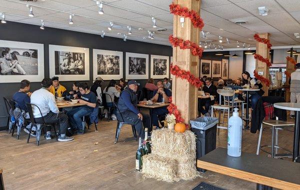 The common eating area is decorated for the holidays.