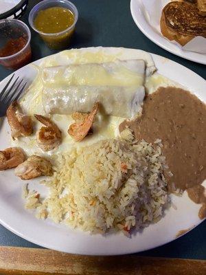 Sour cream chicken enchiladas with shrimp