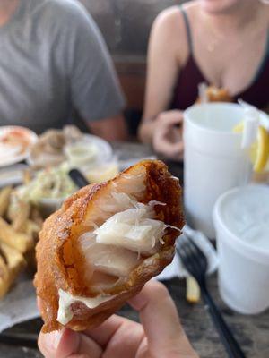 Breading on the grouper, thin and crispy, so good.