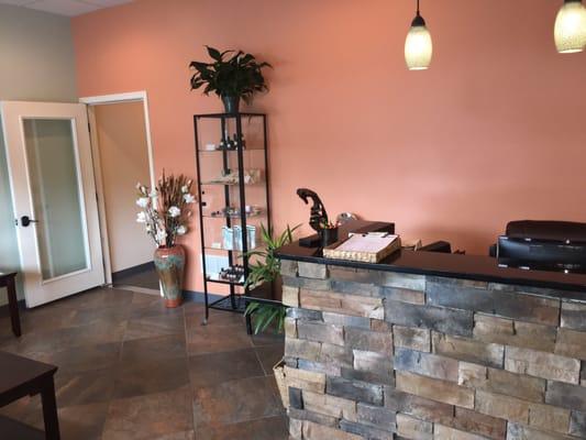 Lobby very inviting with earthy tones and tranquil highlights.