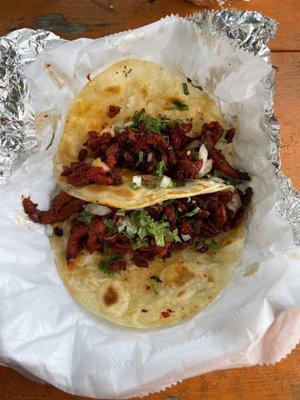 Al pastor tacos on flour. Tortillas are really thin.