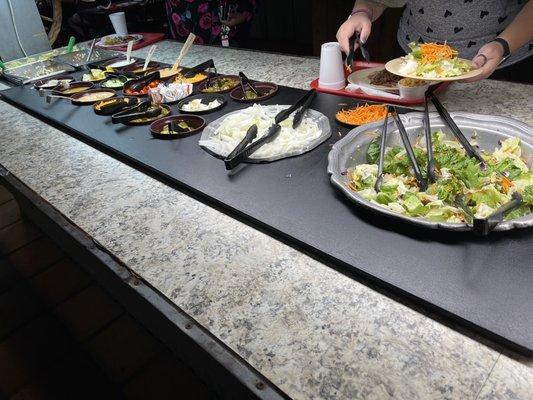 Salad bar. A bit lacking in toppings.