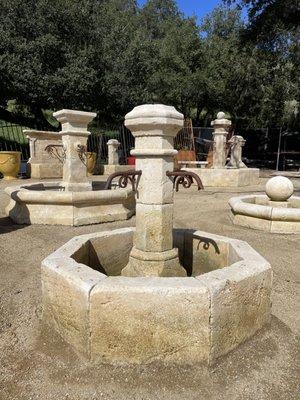 Limestone Fountains From France. Hand carved and hand patina central fountain made in Provence from limestone.