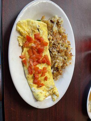 Ham Omelette with tomato and hash browns