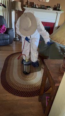 Treating for bed bugs with a chemical solution. Preparing for tent service of this residence