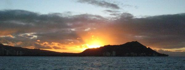 Sunrise over Diamond Head from the deck of the Makani Olu