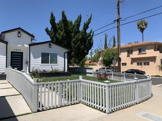 Super custom picket fence. With entry gates on both sides. Solid stain in Culver City, CA 90230