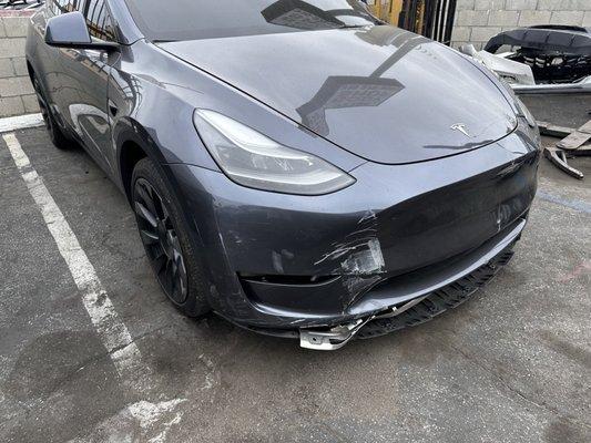 Tesla Model Y before the  repair