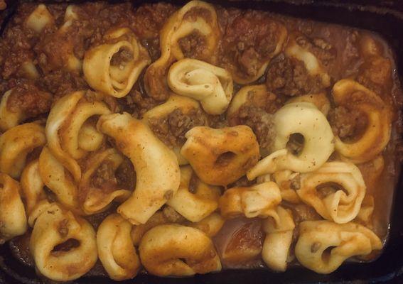 Tortellini with beef and meat sauce.