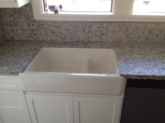 Santa Cecelia White Satin Granite with full backsplash, chiseled edge on peninsula and eased edge elsewhere.