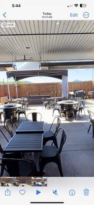 Huge outdoor seating with sun shades, fans and heaters for cold weather