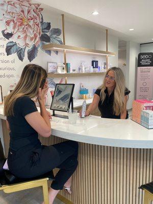 Abbie, Product Specialist, assisting at the Sedo Beauty Bar