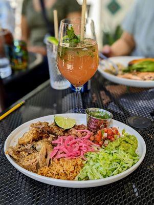 Carnitas bowl and mocktail.