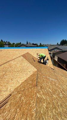 Our team protecting the home with Sheathing (OSB)