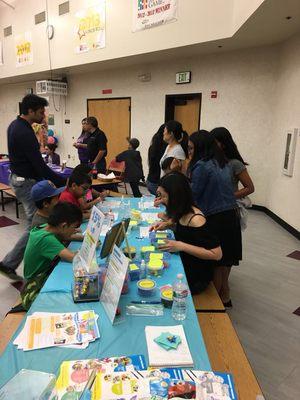 Kids doing the G-Clay crafts at Tom Matsumoto Elementary School Family Fun Night, May 11, 2018