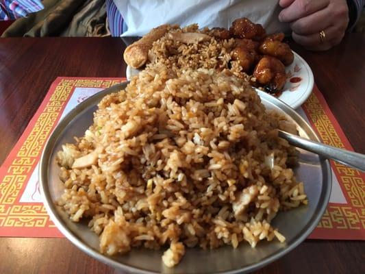 Chicken fried rice, General Tso chicken in the background