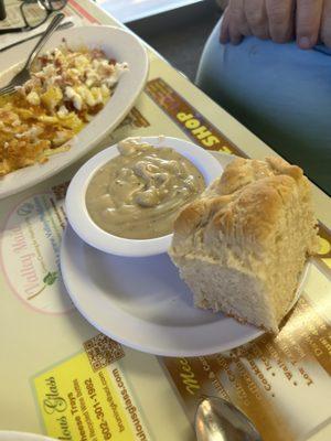 2 over easy eggs, hash and hash browns plus the biscuit and sausage gravy