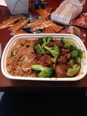 Beef and broccoli with fried rice.