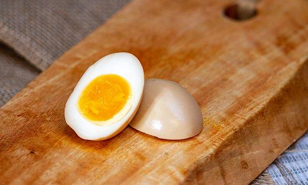 Medium boiled egg marinated in a soya broth.