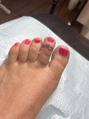 Getting my toe ring tattoo done