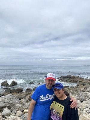 Both my parents and the beautiful view in the back.