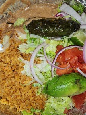 Rice, beans and other fixings that came with the steak and shrimp.