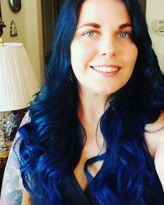 My hair was stripped of my old hair dye, and a beautiful blue was added.