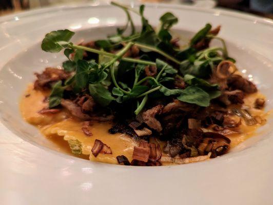 Braised Pork & Ravioli Special. $20. Slow-cooked pork, cheese ravioli, red pepper cream, watercress, crispy leeks.