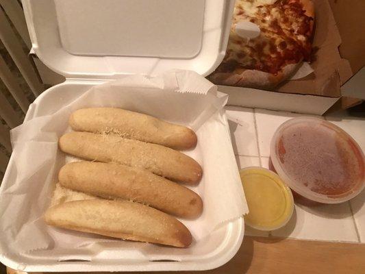 Bread sticks with garlic butter and marinara