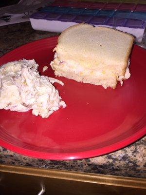 1/2 of my pimento cheese sandwich & potato salad.